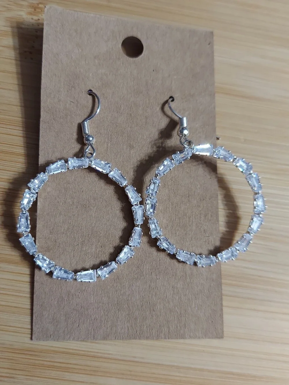 Polished Silver Tone/Faceted Cut Crystal (East-West) Design Hoop Earrings